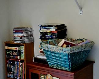 Various VHS, DVDs,CDs, Cassettes, Books, Vinyl Records, Collectibles,  Shelving, Vintage style radio/CD/Cassette player