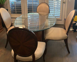 Lot 200: Oval Glass-Top Dining Table with Four Upholstered Wood-inlaid Chairs