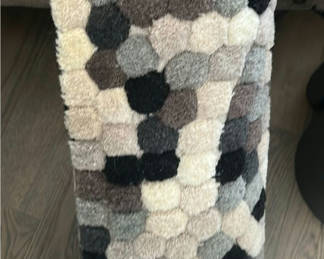 Lot 85: Three Safavieh 100% Wool Area Rugs and Rubber Floor Mats