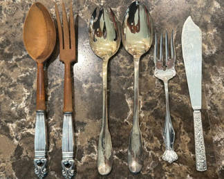Lot 104: Vintage silver-plated flatware with wooden-handled utensils