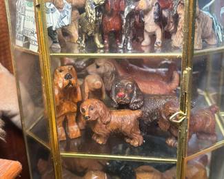 Glass Display Cabinet and Porcelain Cocker Spaniel Figurines