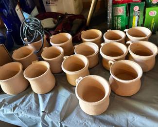 Clay fired mugs -- Great for flower pots. 