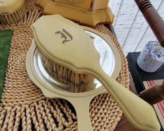 Celluloid vanity pieces and New Haven celluloid clock