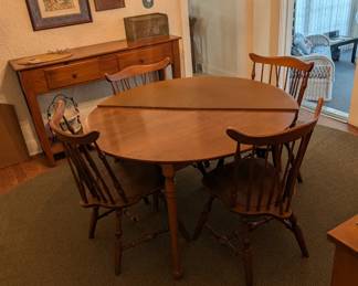 Dining table with 4 chairs.  Matches buffet