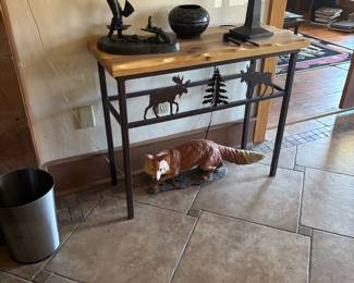 Sofa table with art pieces.  Great fox