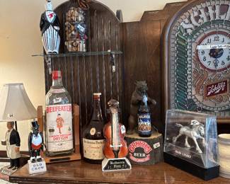 Bar items but extra large Beefeater's bottle on Stand