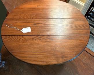 F12 - $45. Small Drop Leaf Side Table. Measures 27" x 23" x 22.25" tall.