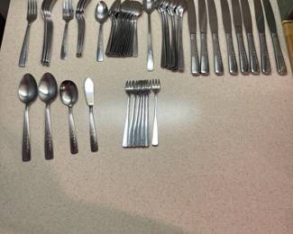 F71 - $40. Oneida Fernwood. Stainless Flatware. 58 Pieces.