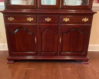 F2 - $150. Pennsylvania Classics China Cabinet. Mirror has a crack in the top right (easily hidden by a plate). Otherwise very good condition. Measures 54" wide x 18" deep x 90" tall.
