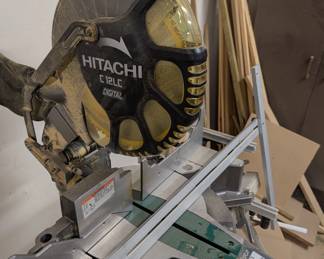 F96 - $250. Hitatchi Compound Miter Saw with Digital Display. Model C12LC Digital. On stand. NOT sliding.