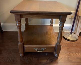 F6 - $40. Wooden Side Table with Single Drawer. Measures 21.5" x 28" x 22.75".
