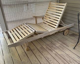F46 - $60. Single Teak Lounge Chair. Head and legs adjust and there is a tray table underneath that pulls out. Could use another coat of finish though.