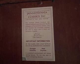 F2 - $150. Pennsylvania Classics China Cabinet. Mirror has a crack in the top right (easily hidden by a plate). Otherwise very good condition. Measures 54" wide x 18" deep x 90" tall.