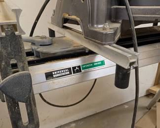 F96 - $250. Hitatchi Compound Miter Saw with Digital Display. Model C12LC Digital. On stand. NOT sliding.