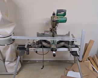 F96 - $250. Hitatchi Compound Miter Saw with Digital Display. Model C12LC Digital. On stand. NOT sliding.