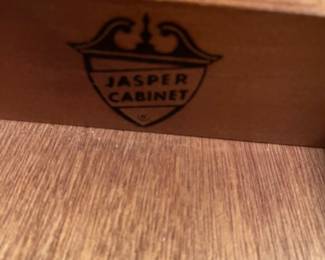 F62 - $125. Jasper Cabinet Roll Top Desk. Measures 55" x 26.75" x 46.5". ON A BASEMENT LEVEL - YOU WILL NEED HELP TO MOVE!