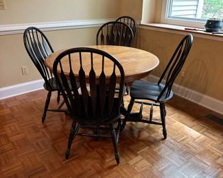 F51 - $150. Solid Wood Pedestal Table with 6 Chairs + 2 Leaves. Table top could use refinishing but it's solid! Some chairs have paint wear from use.