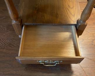 F6 - $40. Wooden Side Table with Single Drawer. Measures 21.5" x 28" x 22.75".