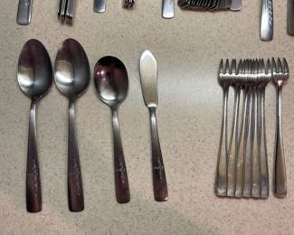 F71 - $40. Oneida Fernwood. Stainless Flatware. 58 Pieces.