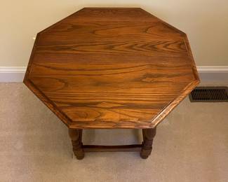 F76 - $30. Solid Wood Octagon Side Table. Measures 26" x 24" tall.