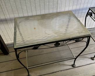 F49 - $40. Glass Top Meadowcraft Side Table. Measures 16.5" x 24" x 22" tall.