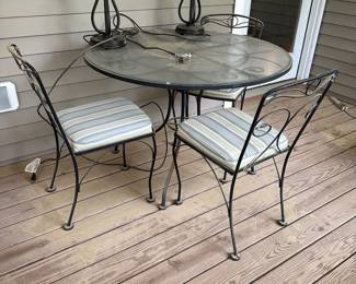 F50 - $250. Meadowcraft Table & 4 Chairs. Table is 43" round x 29" tall. Has been used on a screened in porch. Very good vintage condition - needs cleaned up but sturdy chairs and table!