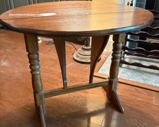F12 - $45. Small Drop Leaf Side Table. Measures 27" x 23" x 22.25" tall.