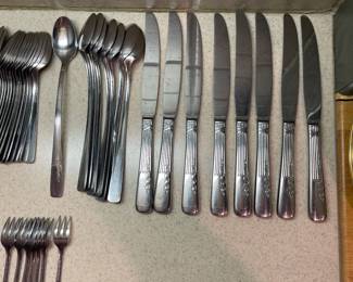 F71 - $40. Oneida Fernwood. Stainless Flatware. 58 Pieces.