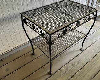 F48 - $40. Iron Side Table. Measures 16" x 24" x 21.5" tall.
