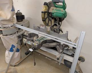 F96 - $250. Hitatchi Compound Miter Saw with Digital Display. Model C12LC Digital. On stand. NOT sliding.