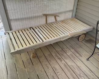 F46 - $60. Single Teak Lounge Chair. Head and legs adjust and there is a tray table underneath that pulls out. Could use another coat of finish though.