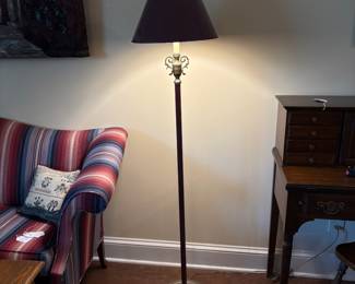 F14 - $50. Brass Floor Lamp with Maroon Shade. Measures 62" tall.
