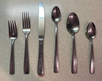 F71 - $40. Oneida Fernwood. Stainless Flatware. 58 Pieces.