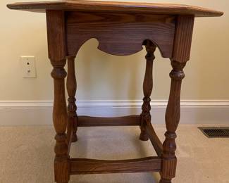 F76 - $30. Solid Wood Octagon Side Table. Measures 26" x 24" tall.