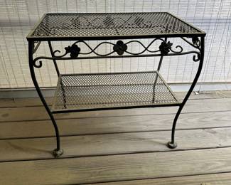 F48 - $40. Iron Side Table. Measures 16" x 24" x 21.5" tall.