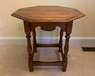 F76 - $30. Solid Wood Octagon Side Table. Measures 26" x 24" tall.