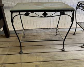 F49 - $40. Glass Top Meadowcraft Side Table. Measures 16.5" x 24" x 22" tall.