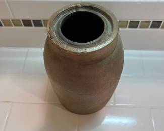 F55 - $60. Antique Canning Crock. Measures 5" x 8.5" tall.