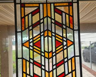 Window stained glass $45 located at another sale this weekend. In North Merritt Island. Do not come here