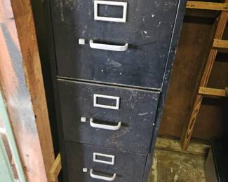 This 5 ft tall middle fine cabinet located at the Merritt Island house sale $25