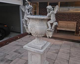 This six ft tall fiber concrete fountain is located at the North Merritt Island house. Do not come here looking for it. It comes apart in the middle for easier moving.