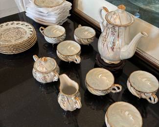 Retro antique iridescent Japanese footed tea cups, saucers, teapot, sugar pot, and creamer