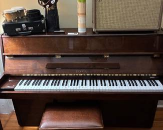 Piano- a petal needs repair. Hand drum, s, amp in excellent condition 