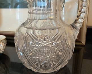 Clear cut-glass pitcher/vase (NB: small chip near spout)
