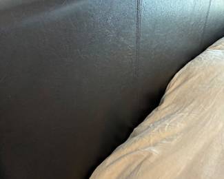 Queen size bed frame and mattress (detail of headboard)