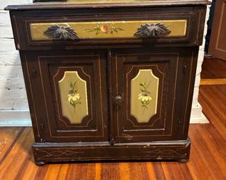 Hand painted antique washstand. One of four piece bed set.