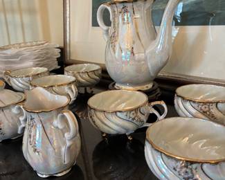 Retro antique iridescent Japanese footed tea cups, saucers, teapot, sugar pot, and creamer