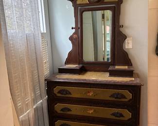 Hand painted wooden antique dresser. One of four piece bed set. 