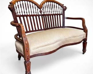 Antique SpindleBack Settee With Carved Lion Heads