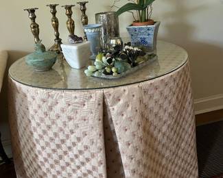 Skirted round table, McCarty covered bunny dish,  brass candlesticks and collection of Jade fruit